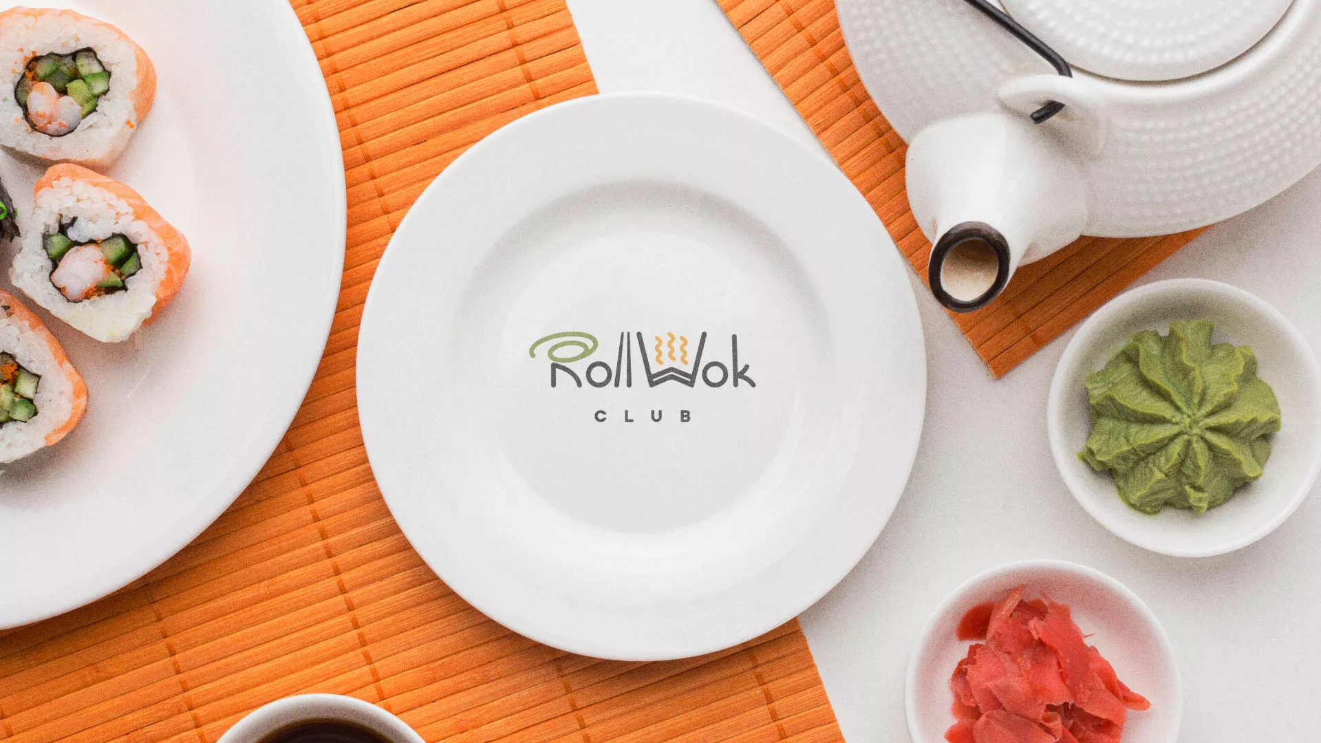 Разработка логотипа и фирменного стиля в Фокино для суши-бара «Roll Wok Club» Разработка логотипа и фирменного стиля в Фокино для суши-бара «Roll Wok Club»